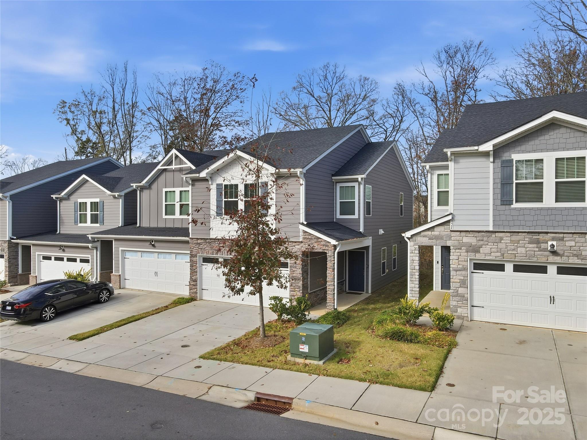 3528 Auburn Curb Road Charlotte, NC 28217 - Photo 35 of 35 a front view of a house with a yard and garage