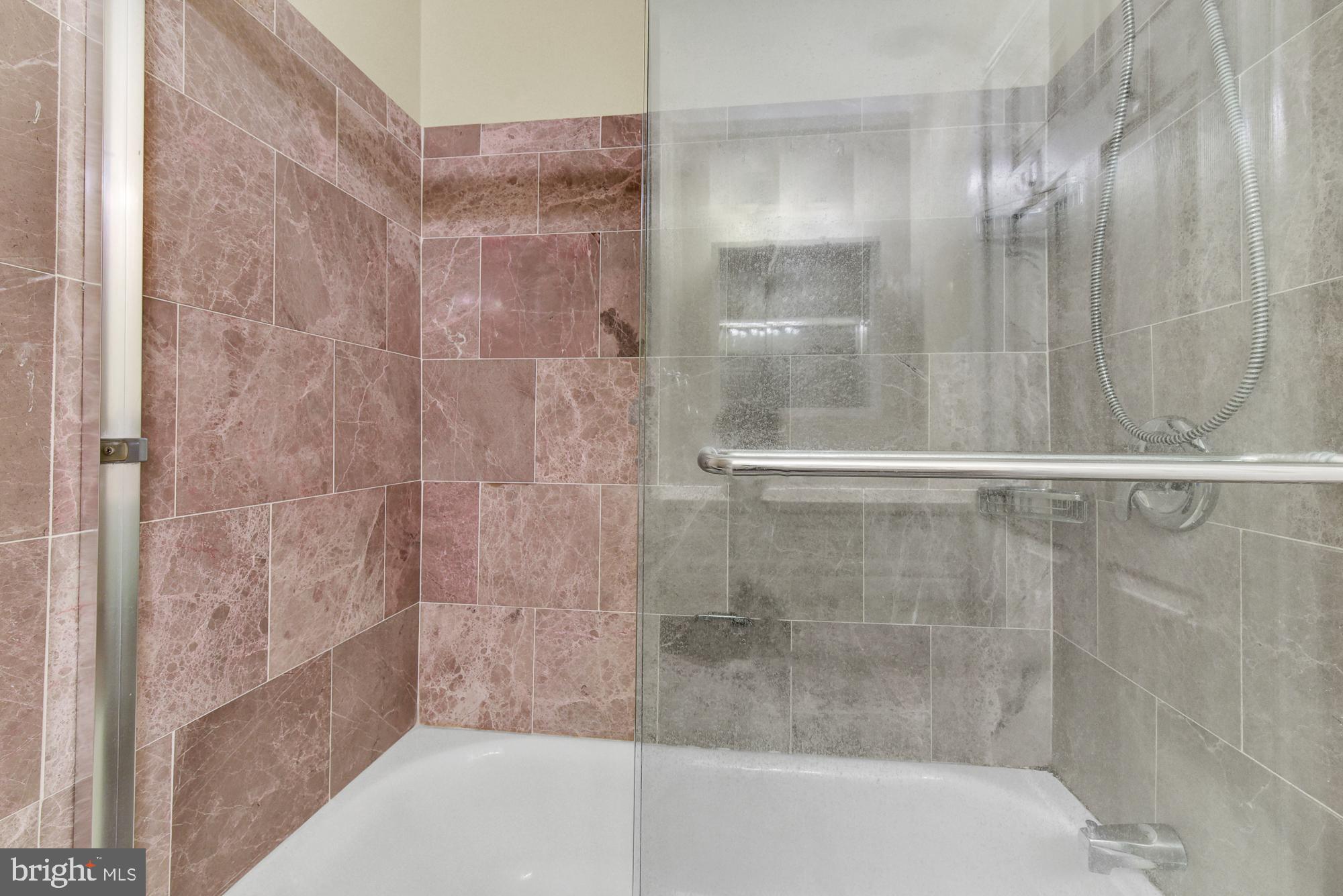 17604 Kohlhoss Road Poolesville, MD 20837 - Photo 20 of 41 Tile tub and shower in hall bath