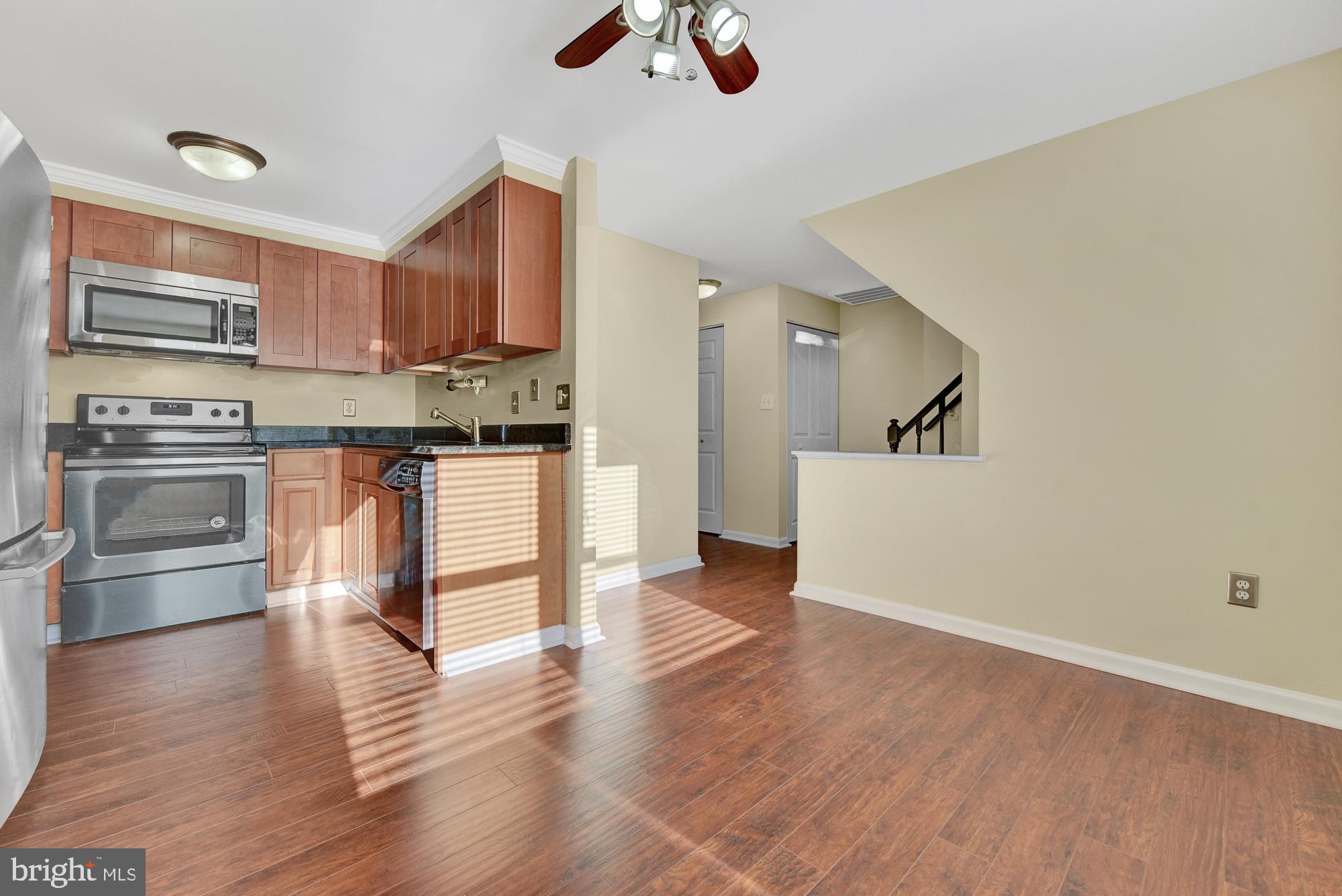 17604 Kohlhoss Road Poolesville, MD 20837 - Photo 3 of 41 Gleaming high grade indestructible laminate floors