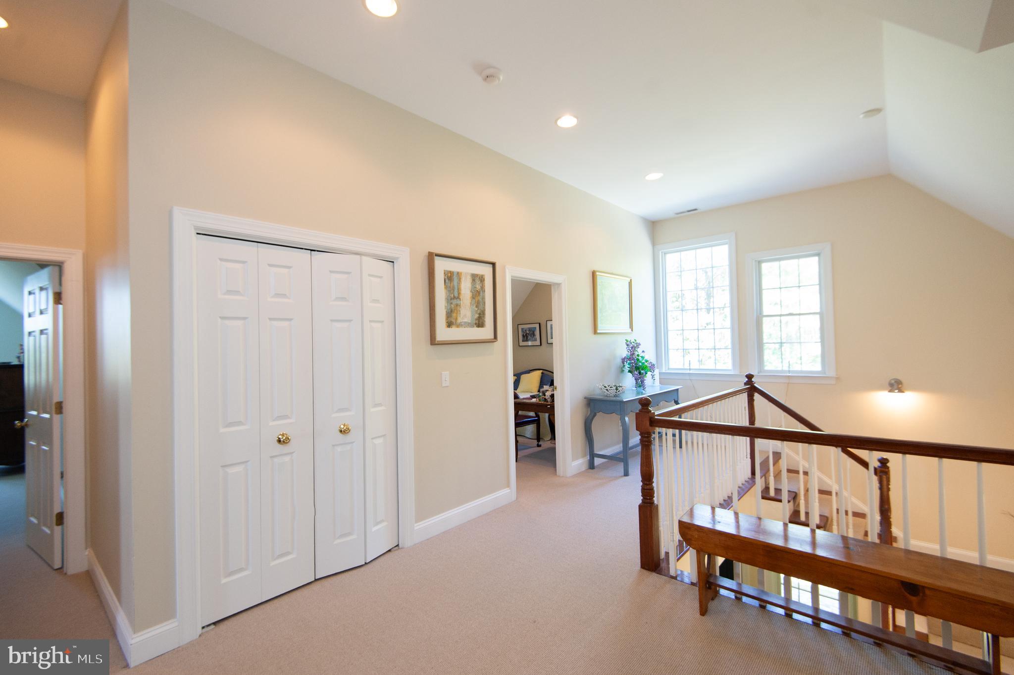 5332 Ragged Point Road Cambridge, MD 21613 - Photo 29 of 65 2nd Floor landing area with storage closets