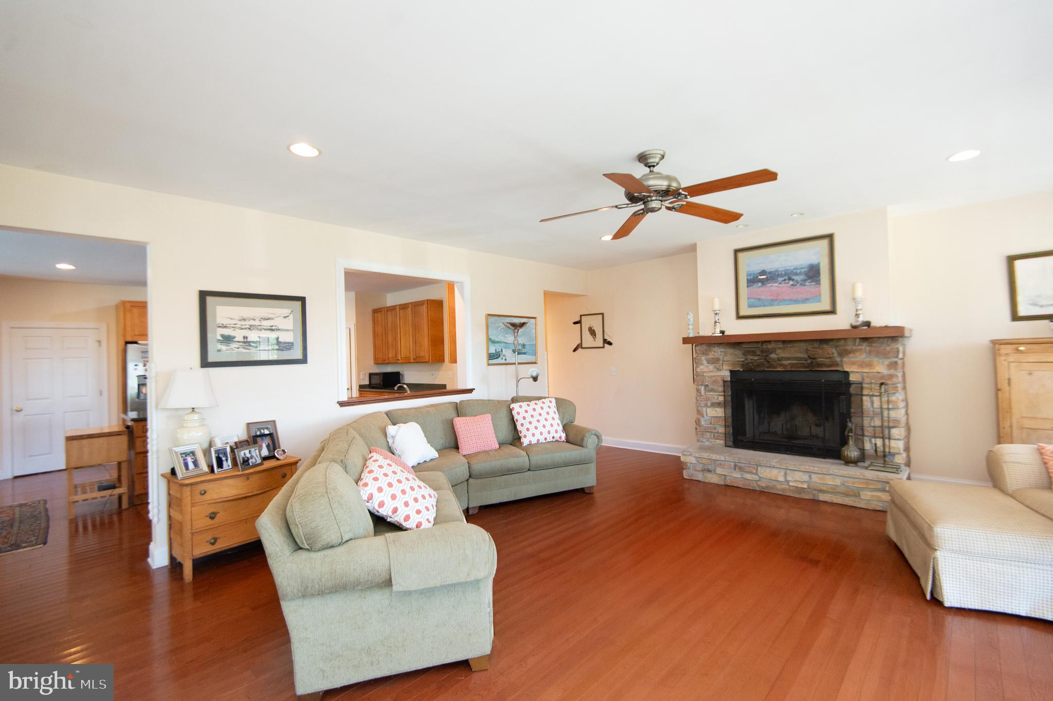 5332 Ragged Point Road Cambridge, MD 21613 - Photo 6 of 65 Great Room with Stone Fireplace