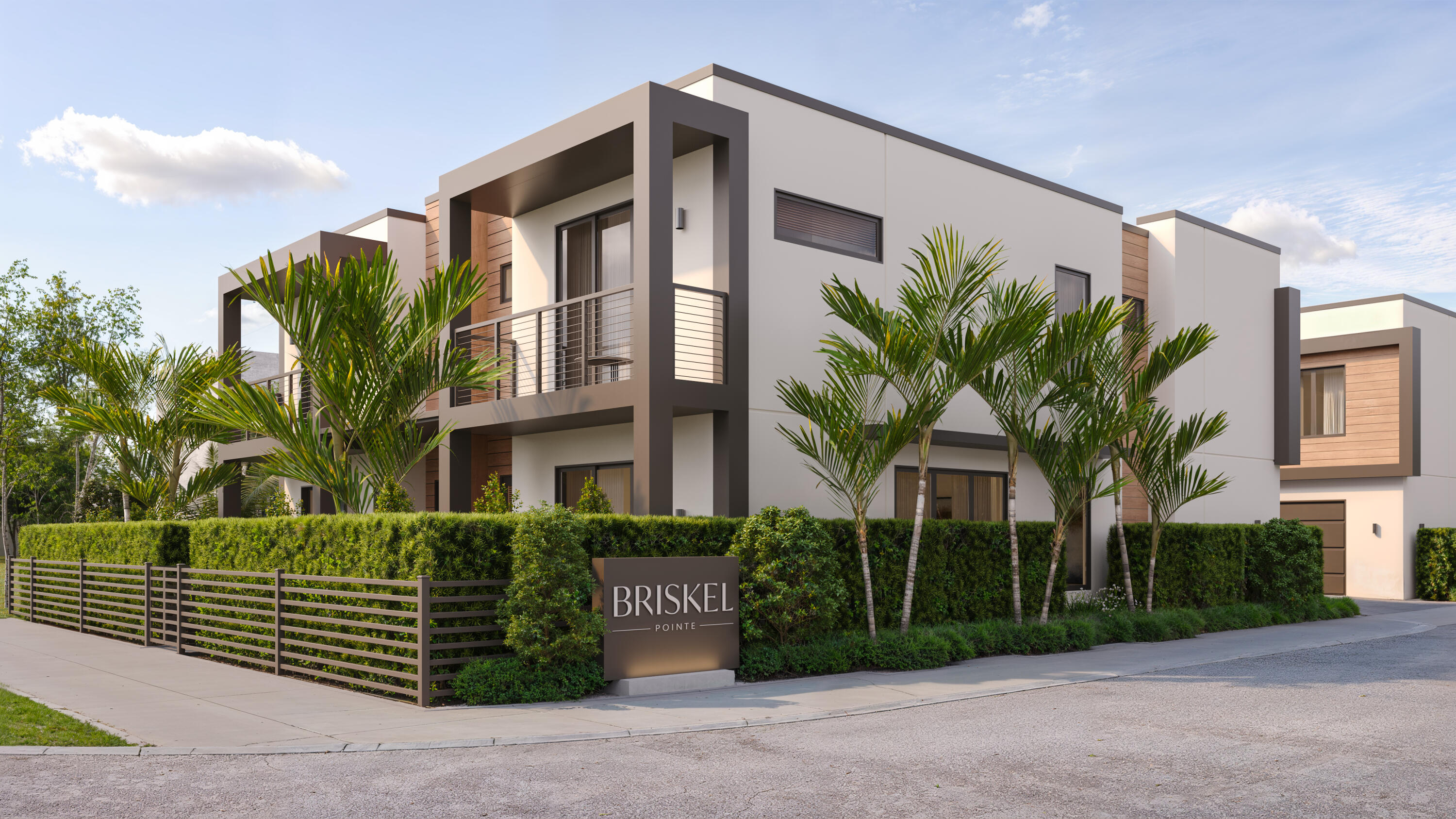 6803 Northeast Briskel Pointe Drive Boca Raton, FL 33487 - Photo 2 of 23 a front view of a house with a garden
