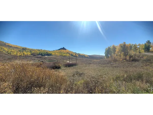 a view of mountain with lake