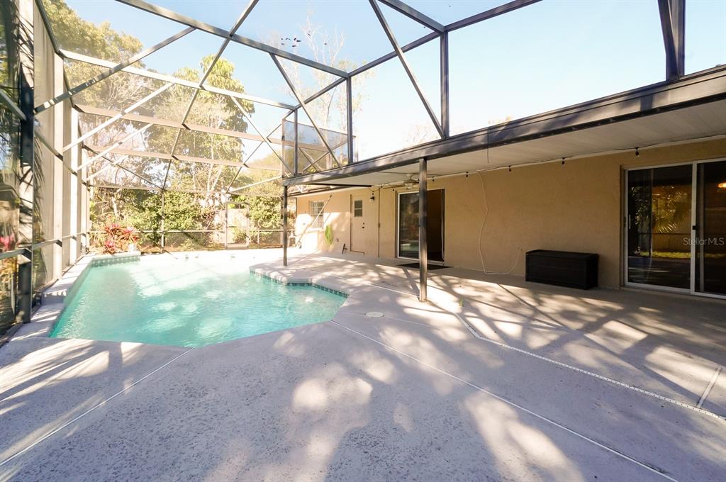 6260 Morning Mist Lane Orlando, FL 32819 - Photo 26 of 27 a backyard of a house