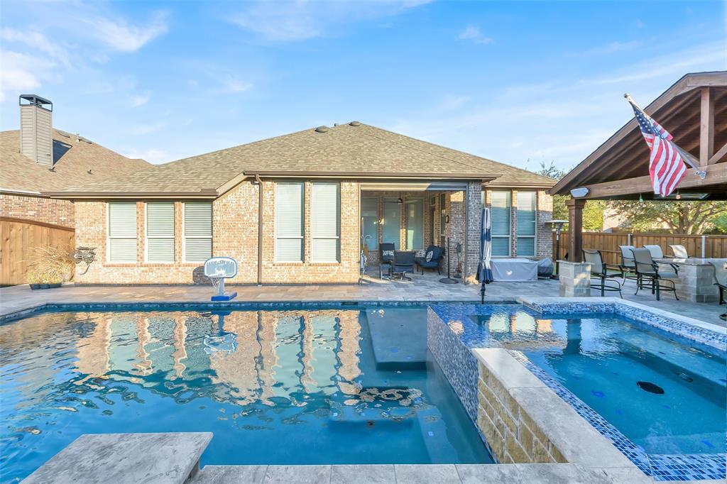 1001 West Bluff Way Roanoke, TX 76262 - Photo 29 of 40 View of pool with a fenced backyard, a patio, and a pool with connected hot tub