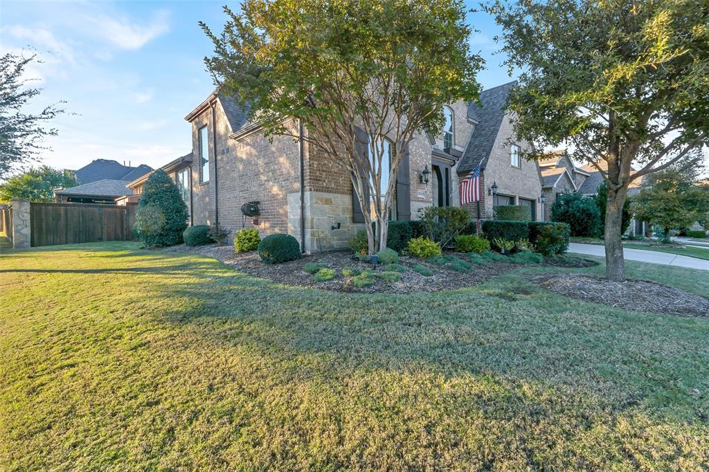 1001 West Bluff Way Roanoke, TX 76262 - Photo 3 of 40 View of home's exterior with stone siding