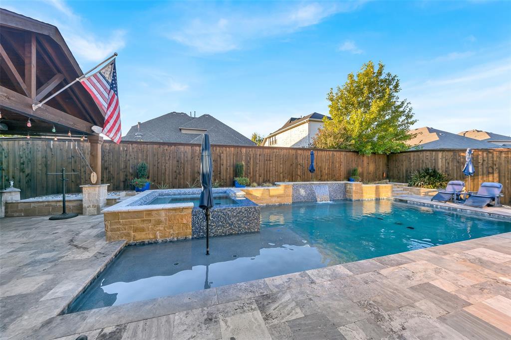 1001 West Bluff Way Roanoke, TX 76262 - Photo 37 of 40 View of swimming pool with a patio, a fenced backyard, and a pool with connected hot tub