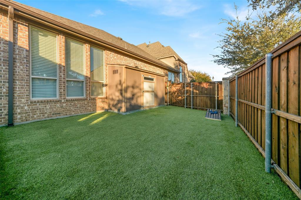 1001 West Bluff Way Roanoke, TX 76262 - Photo 40 of 40 View of fenced backyard and artificial turf area.