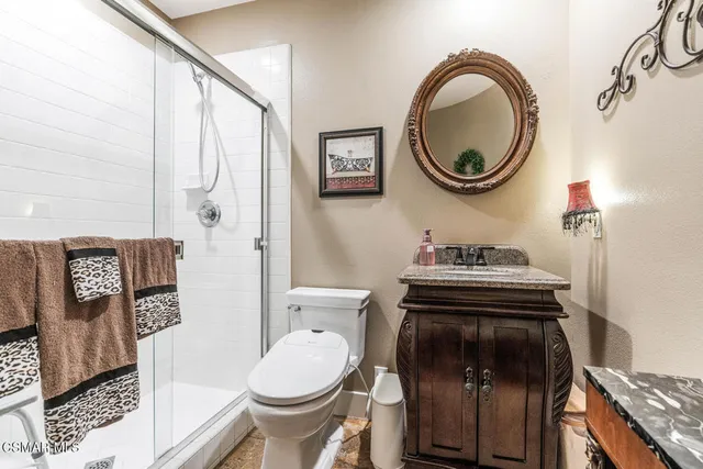 a living room with patio a couch and chairs