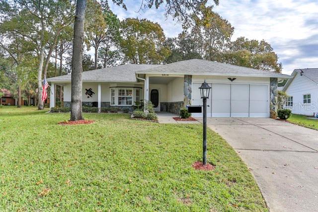6414 Lost Tree Lane Spring Hill, FL 34606 - Photo 1 of 1 Great Curb Appeal