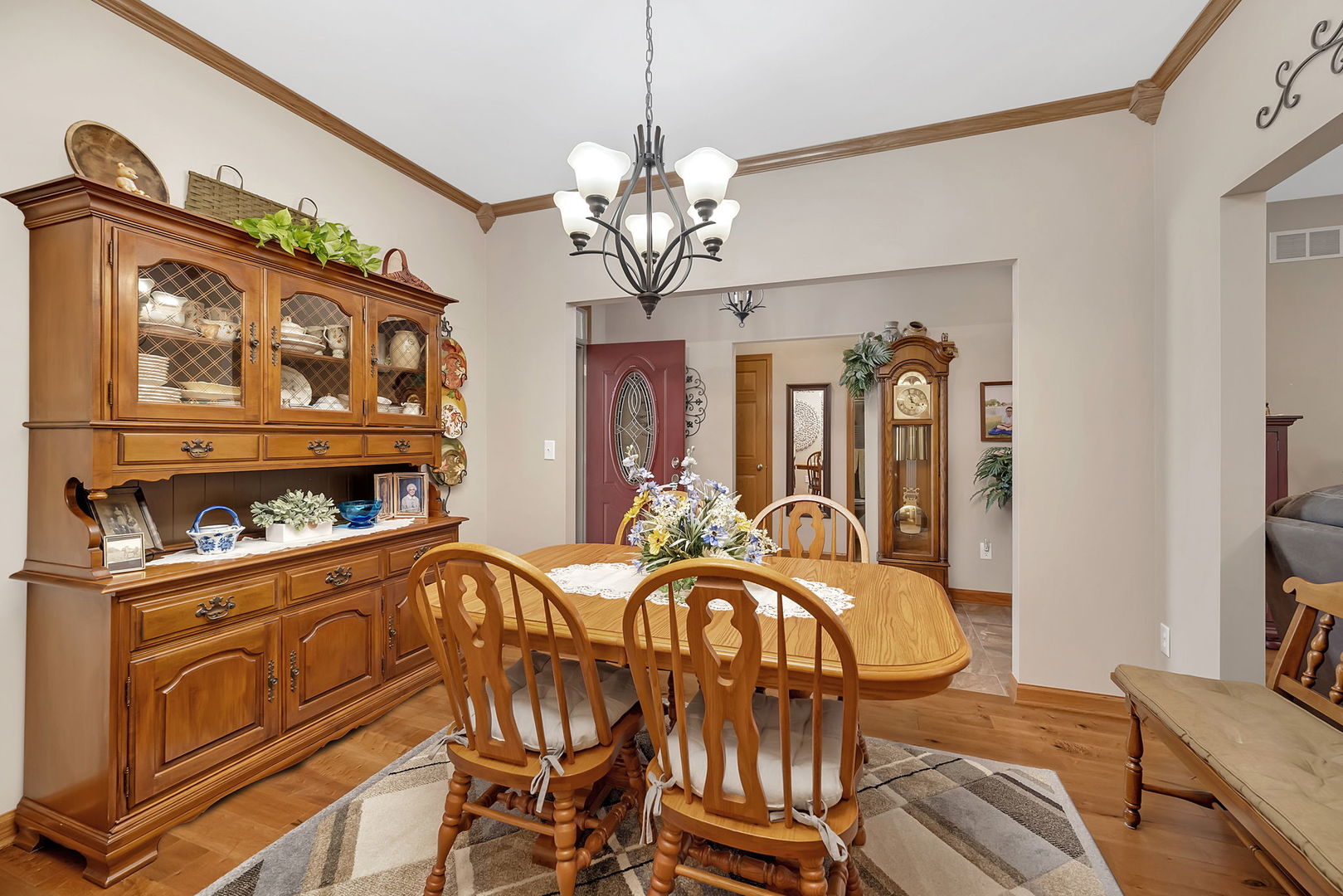 1761 Red Willow Road Morris, IL 60450 - Photo 15 of 38 a view of a dining room with furniture a chandelier and wooden floor