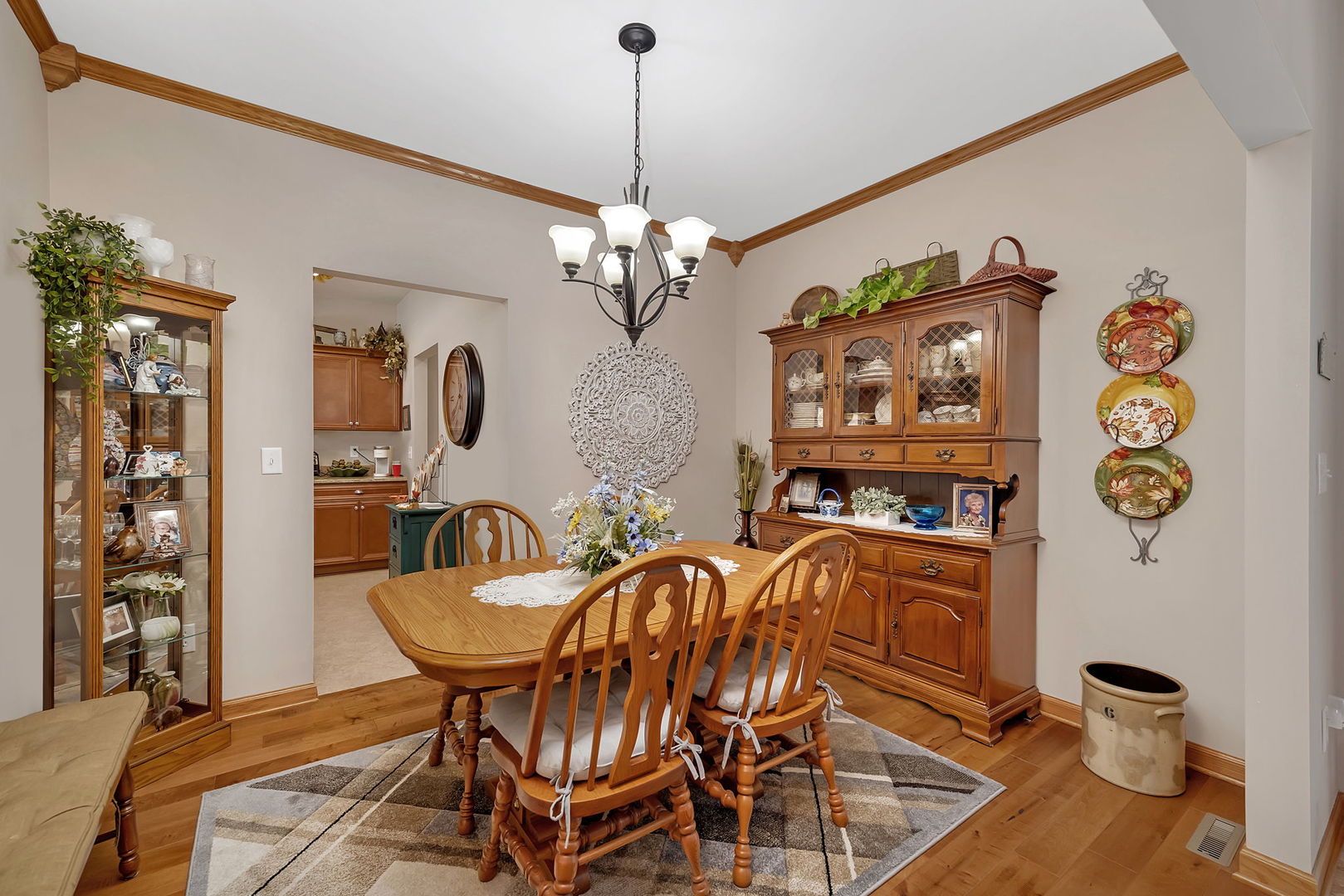 1761 Red Willow Road Morris, IL 60450 - Photo 16 of 38 a view of a dining room with furniture and wooden floor