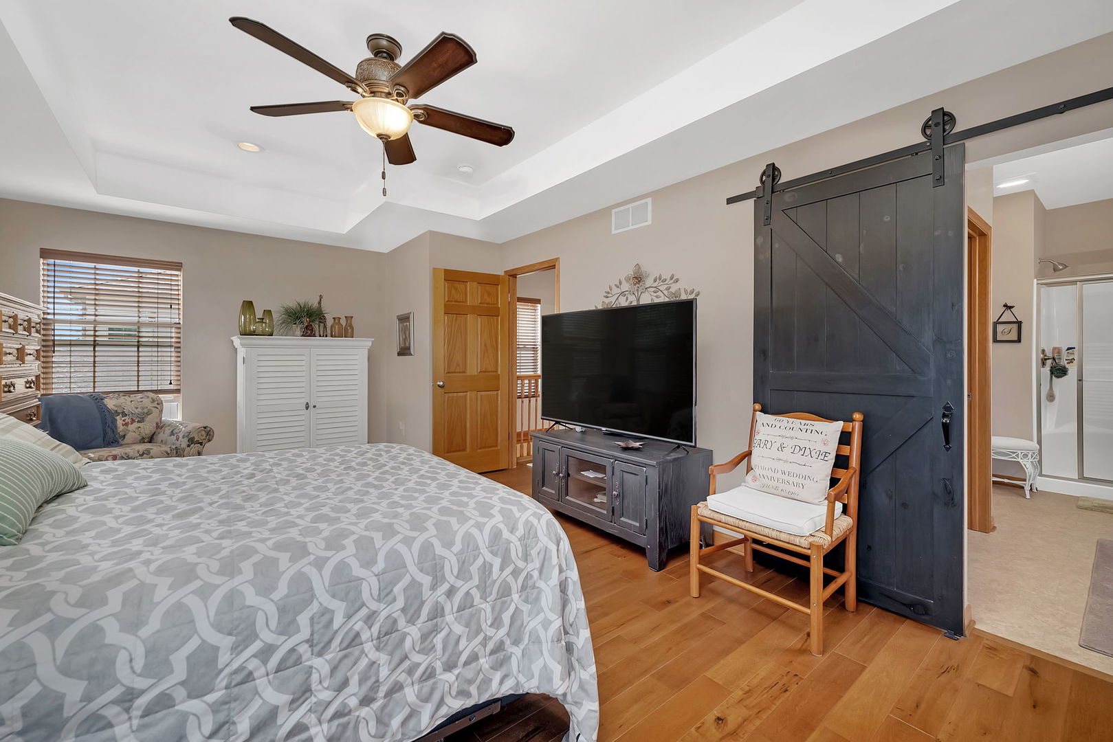 1761 Red Willow Road Morris, IL 60450 - Photo 18 of 38 a bedroom with a bed and a flat screen tv