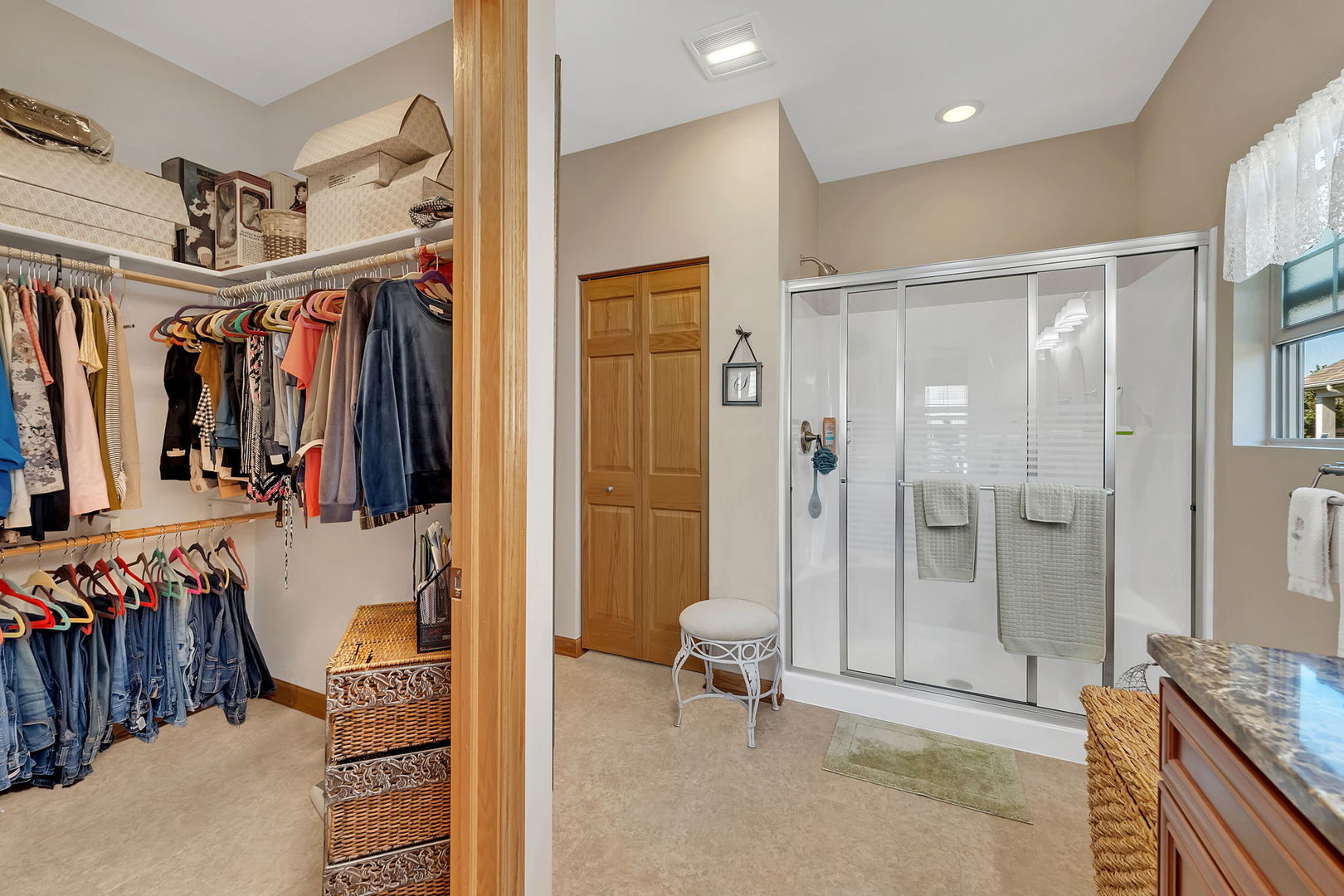 1761 Red Willow Road Morris, IL 60450 - Photo 20 of 38 a view of walk in closet with clothes and shoes