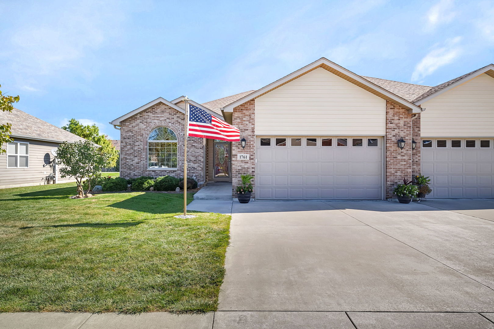 1761 Red Willow Road Morris, IL 60450 - Photo 2 of 38 a front view of a house with a yard and garage
