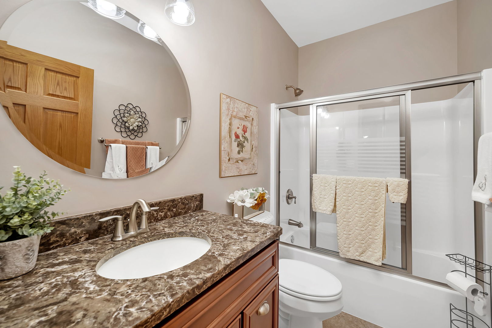 1761 Red Willow Road Morris, IL 60450 - Photo 23 of 38 a bathroom with a granite countertop sink a toilet a mirror a vanity and shower