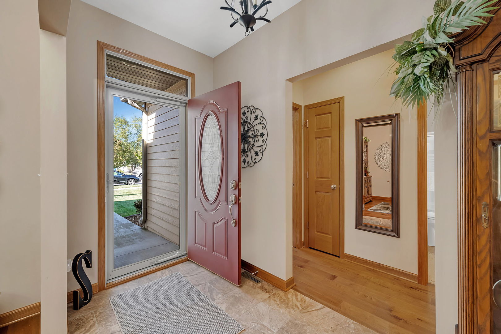 1761 Red Willow Road Morris, IL 60450 - Photo 4 of 38 a view of a hallway with wooden floor and door