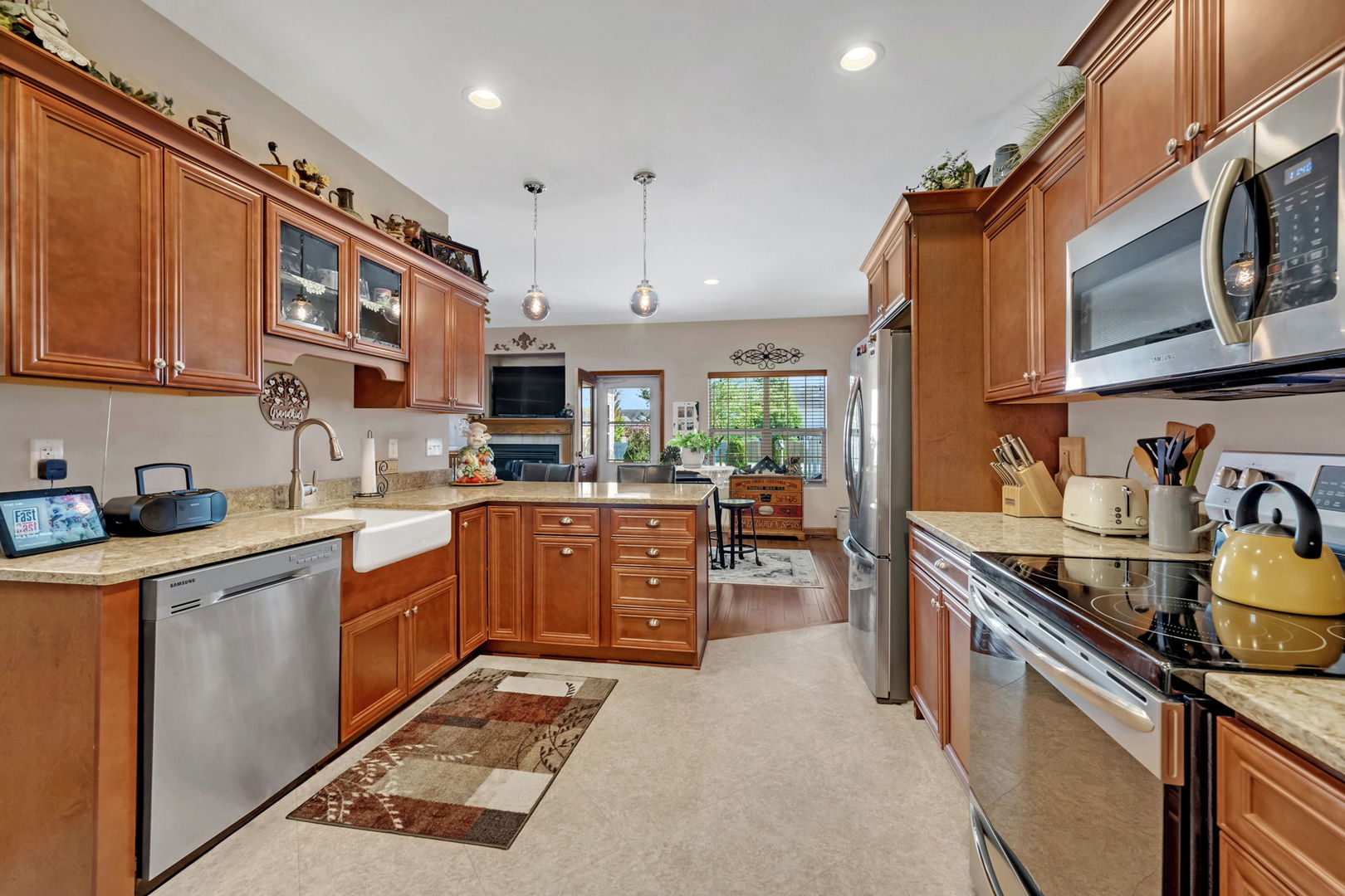 1761 Red Willow Road Morris, IL 60450 - Photo 8 of 38 a kitchen with stainless steel appliances granite countertop a sink stove and cabinets