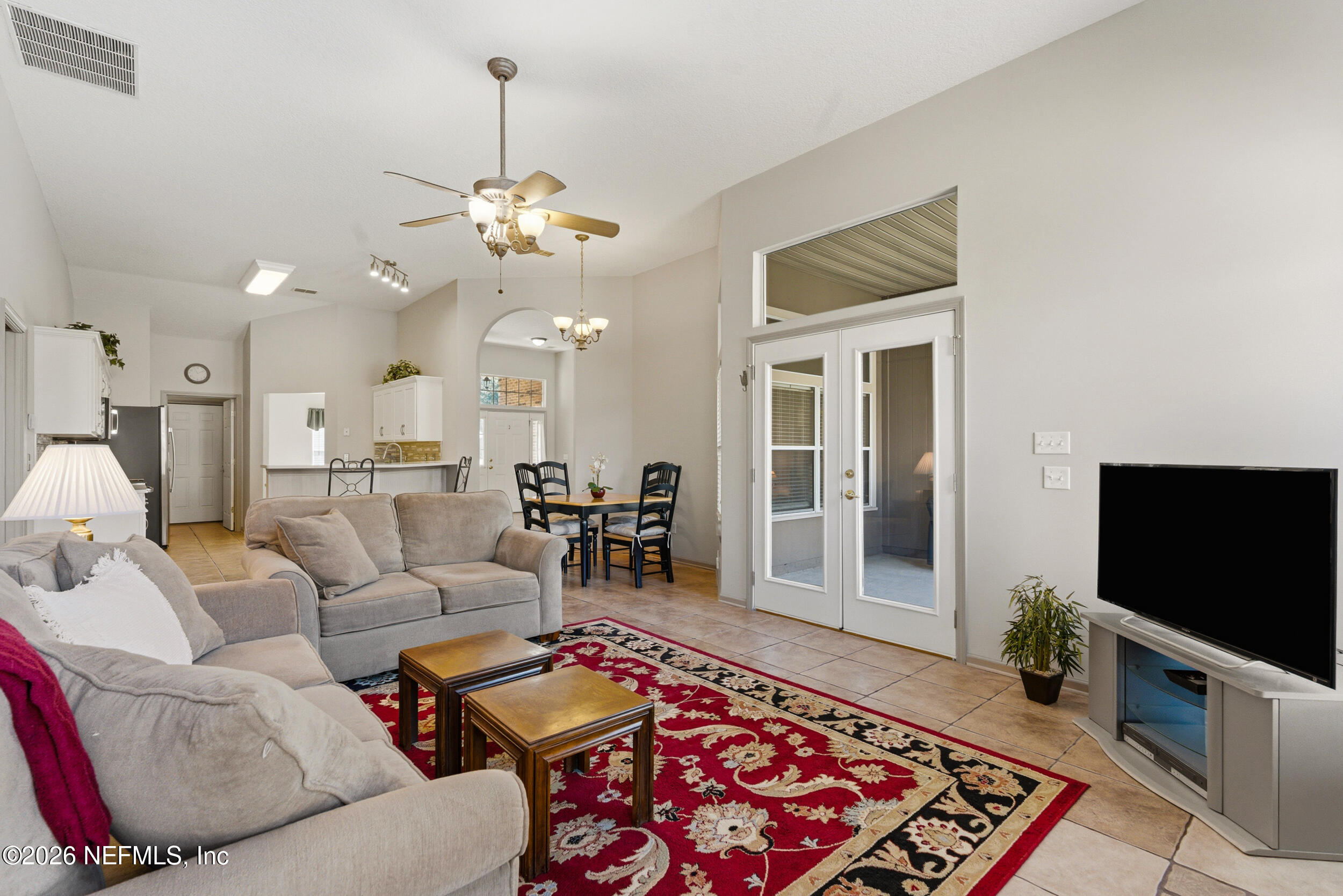 4309 Rye Court St. Johns, FL 32259 - Photo 17 of 55 a living room with furniture and a flat screen tv