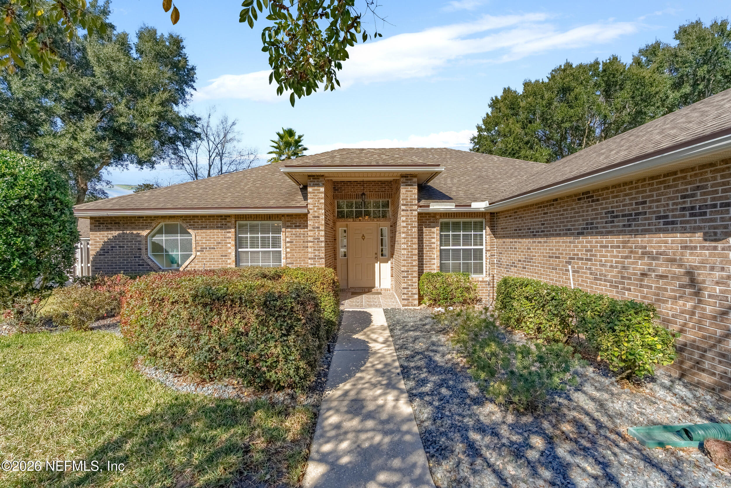 4309 Rye Court St. Johns, FL 32259 - Photo 2 of 55 a front view of a house with garden