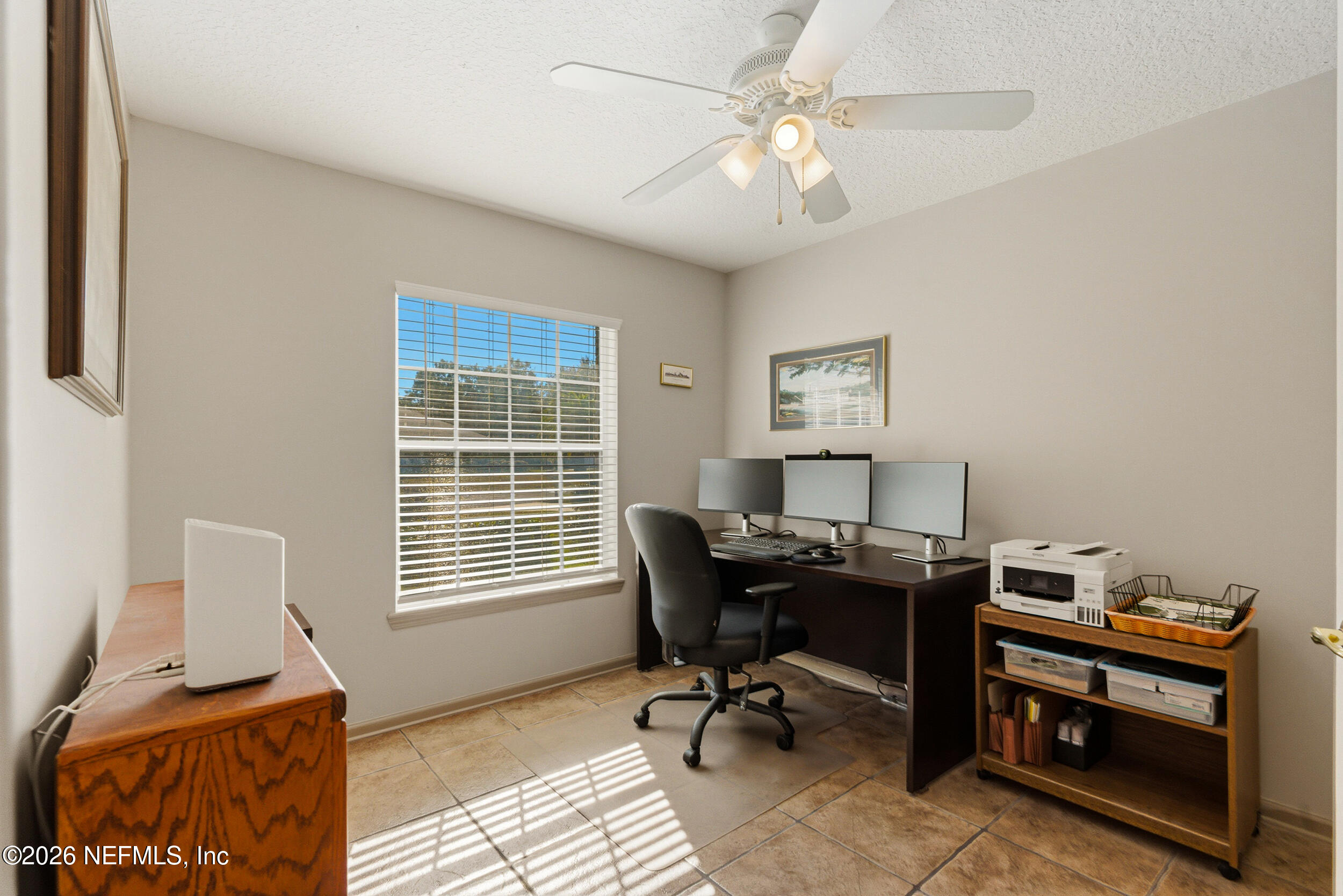 4309 Rye Court St. Johns, FL 32259 - Photo 31 of 55 a view of a workspace with furniture and a window