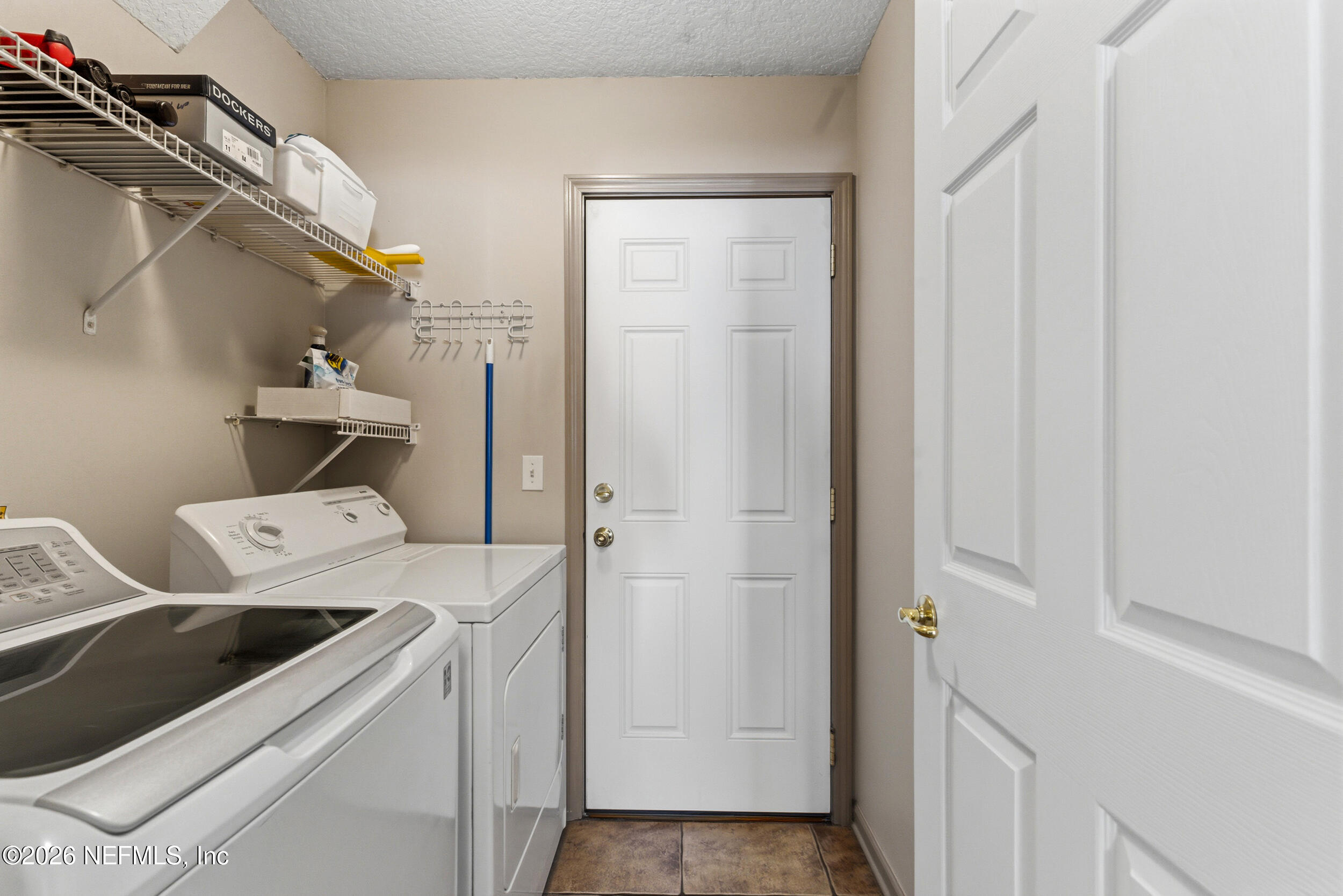 4309 Rye Court St. Johns, FL 32259 - Photo 32 of 55 a utility room with dryer and washer