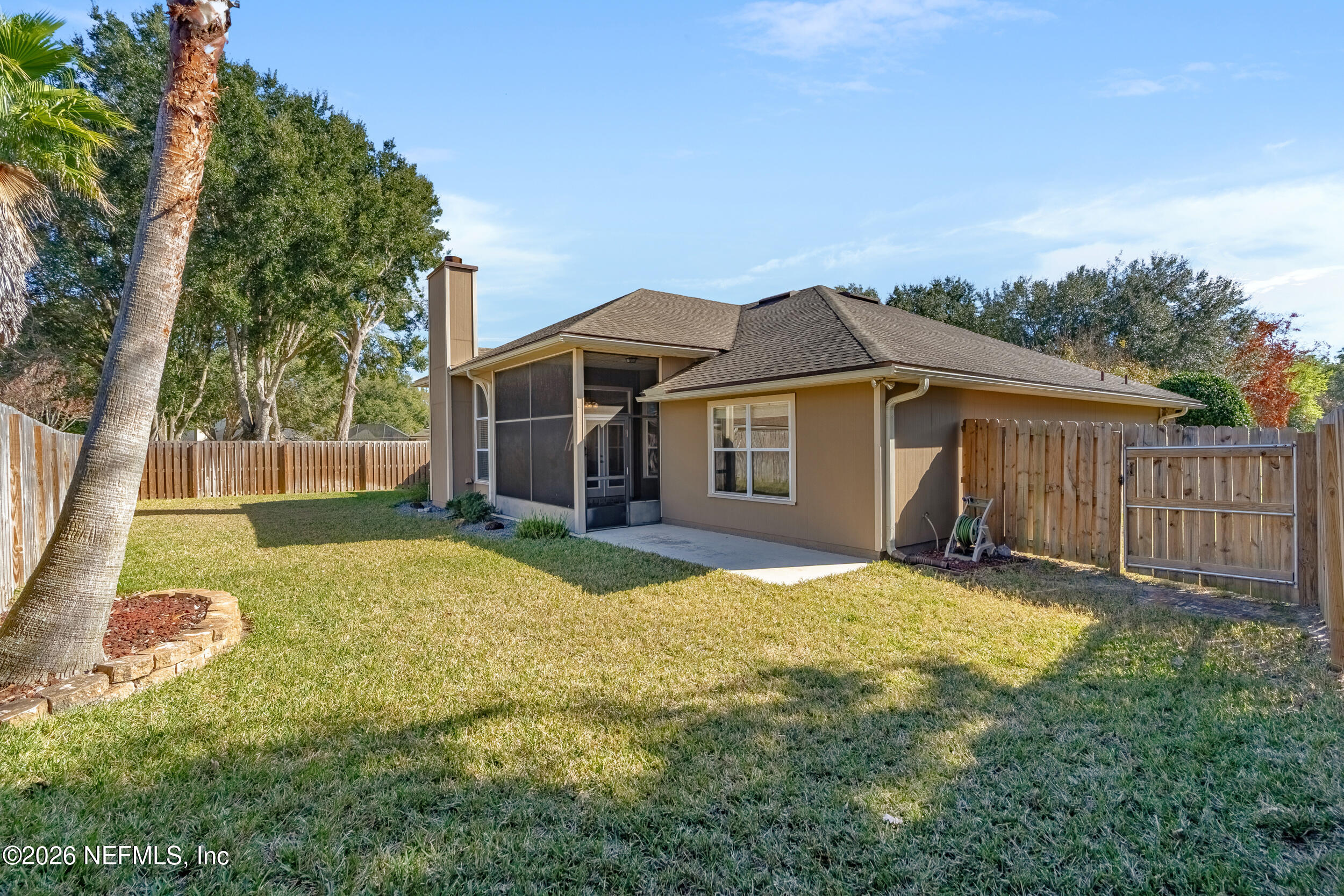 4309 Rye Court St. Johns, FL 32259 - Photo 35 of 55 a view of a house with backyard and tree