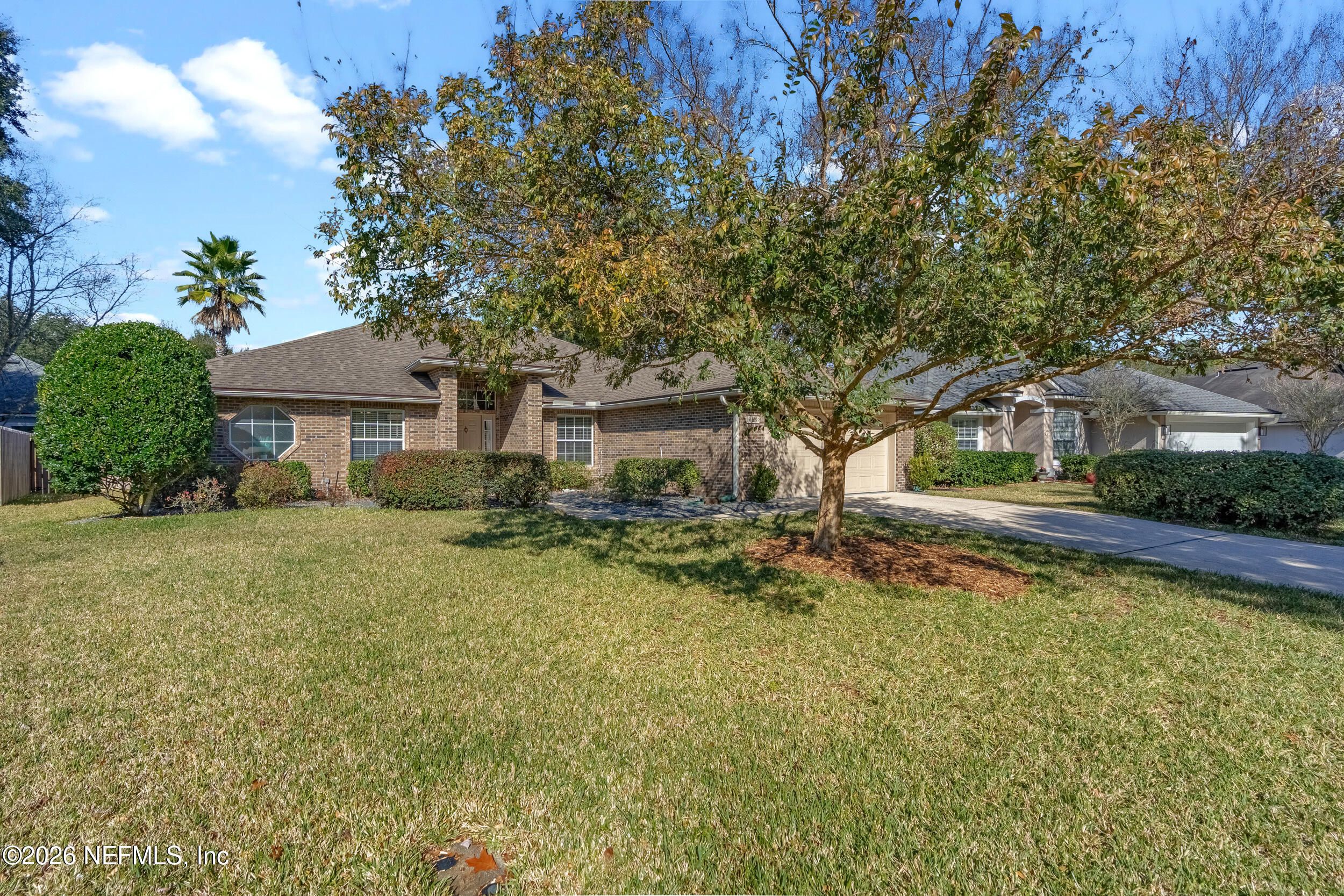4309 Rye Court St. Johns, FL 32259 - Photo 39 of 55 a front view of a house with a garden