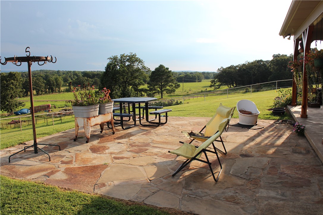 2210 Weiterer Road Scranton, AR 72863 - Photo 12 of 49 Expansive flagstone patio with a partial covered area
