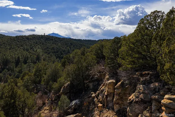 a view of mountain view with lots of bushes