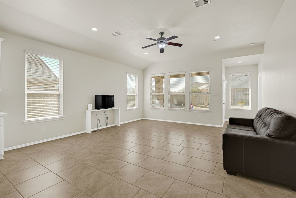 4535 Mondial Road Katy, TX 77493 - Photo 14 of 26 Large living room with views of backyard