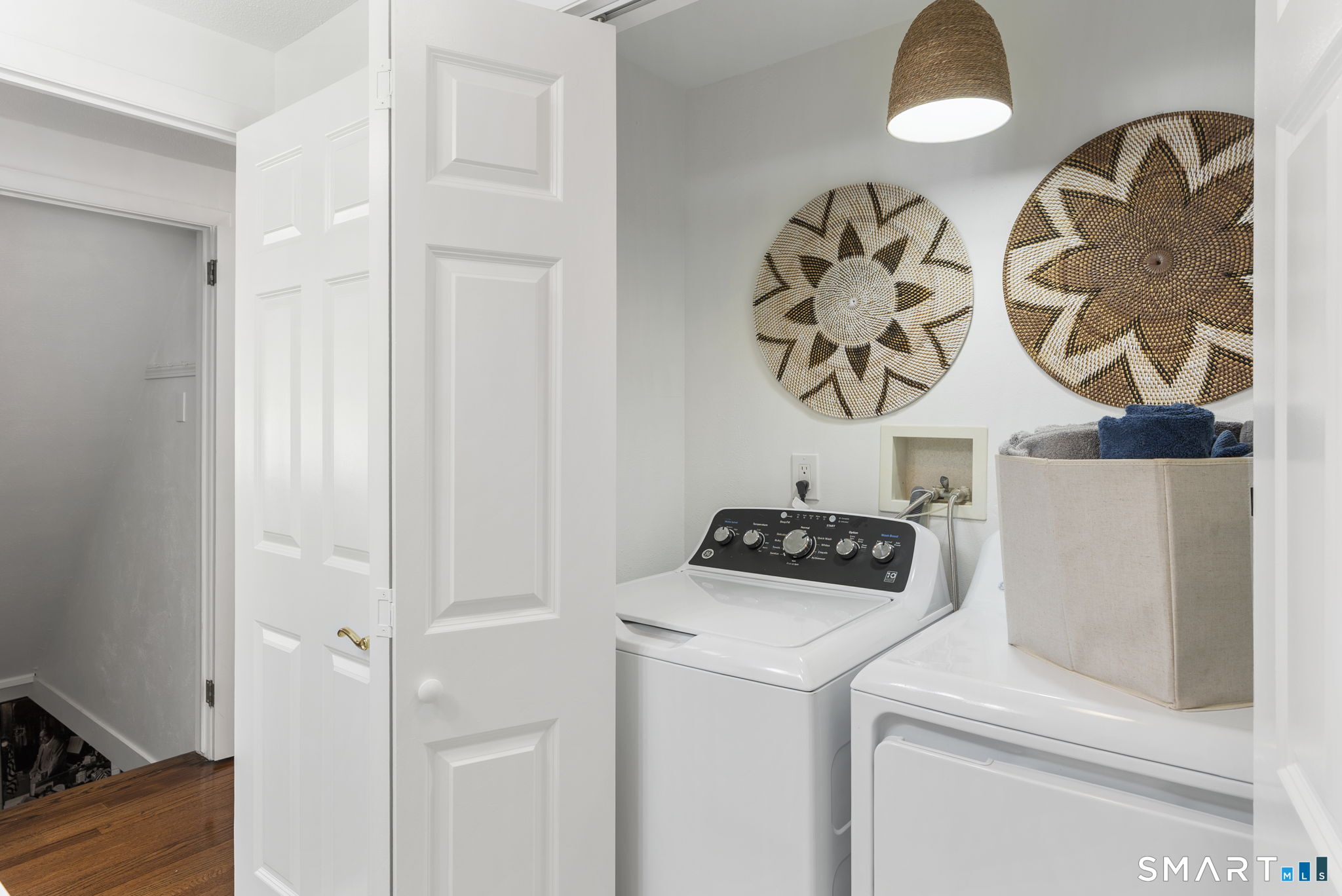 24 Ichabod Road Simsbury, CT 06070 - Photo 13 of 43 a kitchen with a stove and a white cabinet