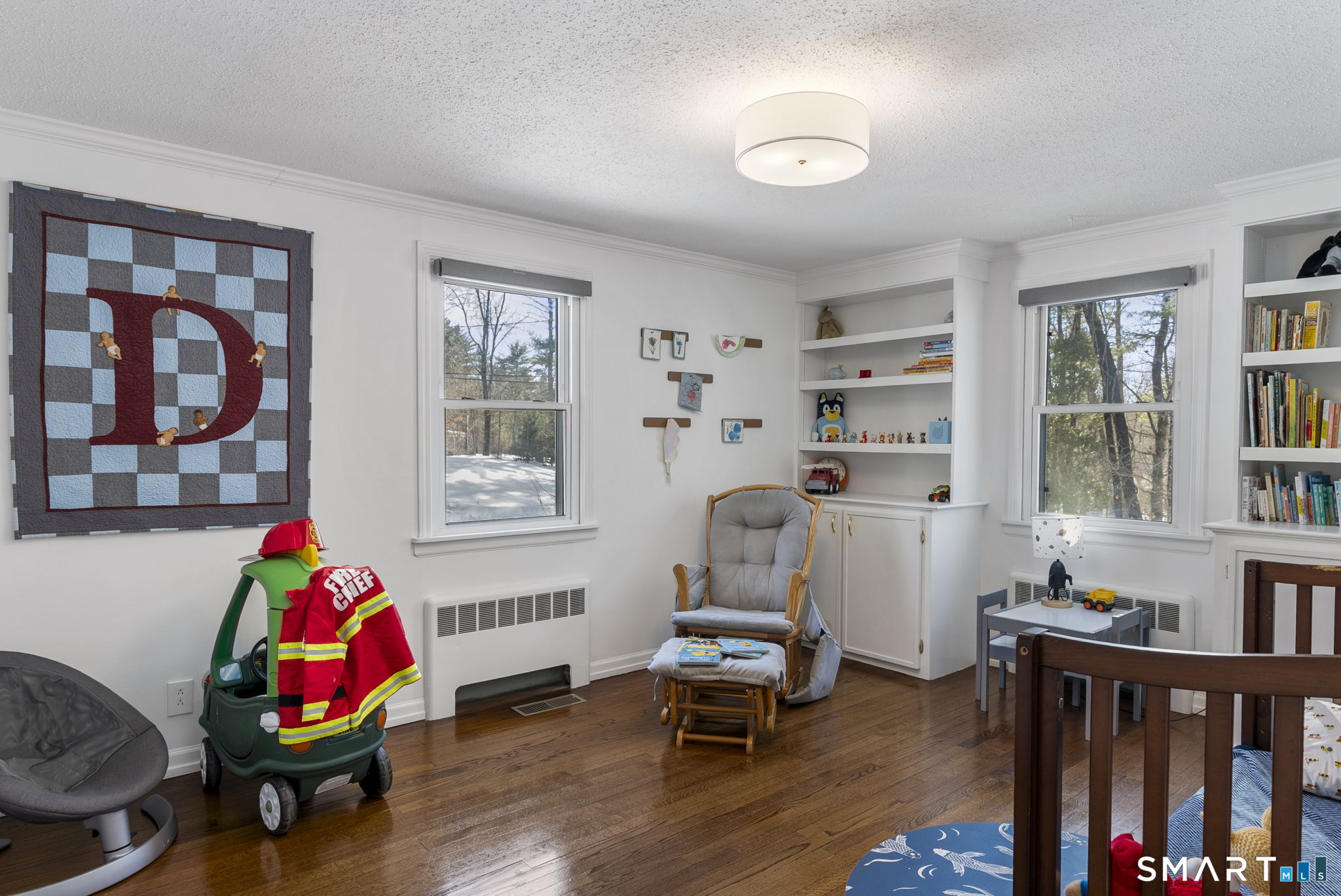 24 Ichabod Road Simsbury, CT 06070 - Photo 14 of 43 a living room with furniture and wooden floor