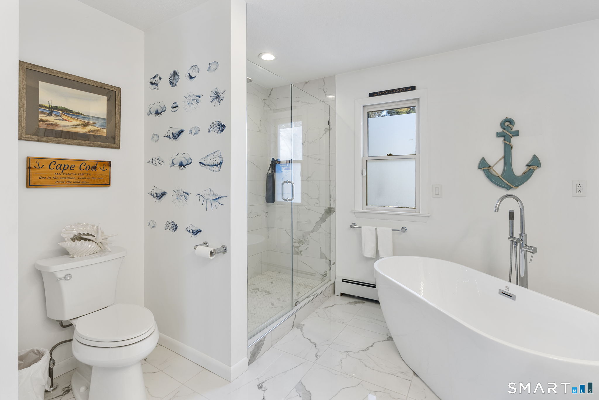 24 Ichabod Road Simsbury, CT 06070 - Photo 18 of 43 a bathroom with a toilet sink and shower