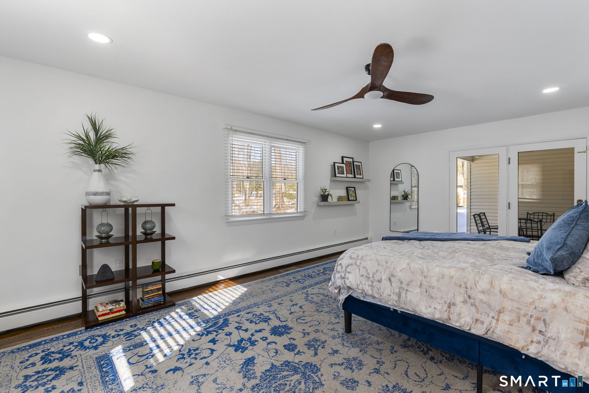 24 Ichabod Road Simsbury, CT 06070 - Photo 20 of 43 a bedroom with a bed and a window