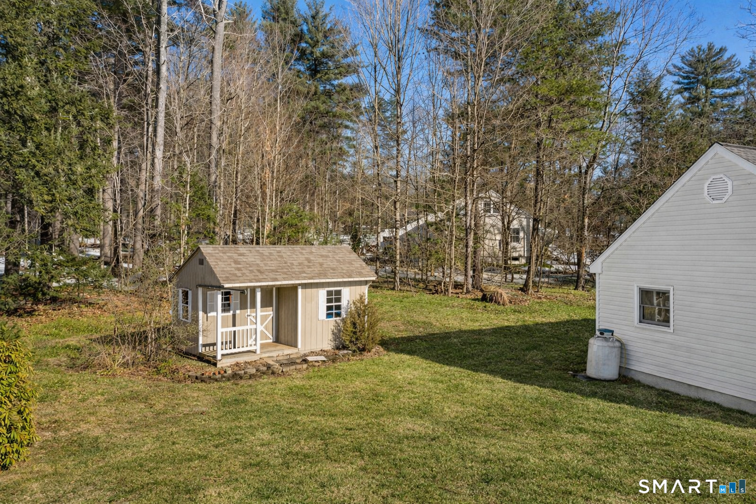 24 Ichabod Road Simsbury, CT 06070 - Photo 39 of 43 a view of a house with a yard