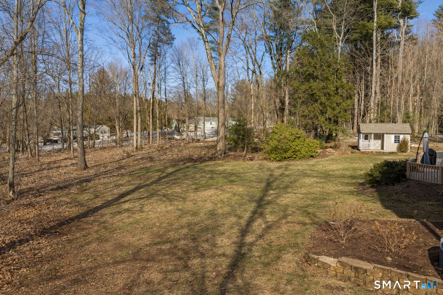 24 Ichabod Road Simsbury, CT 06070 - Photo 40 of 43 a view of a yard with trees