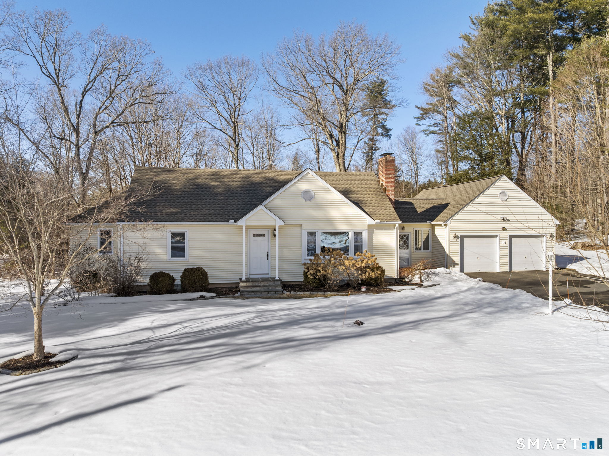 24 Ichabod Road Simsbury, CT 06070 - Photo 42 of 43 a view of a house with a yard