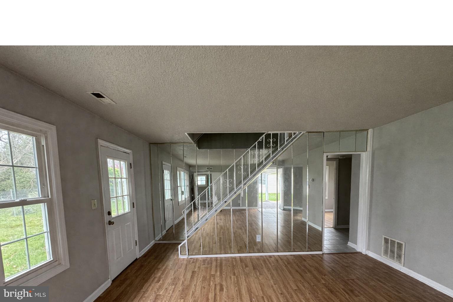 75 Mainbridge Lane Willingboro, NJ 08046 - Photo 3 of 8 wooden floor in an empty room