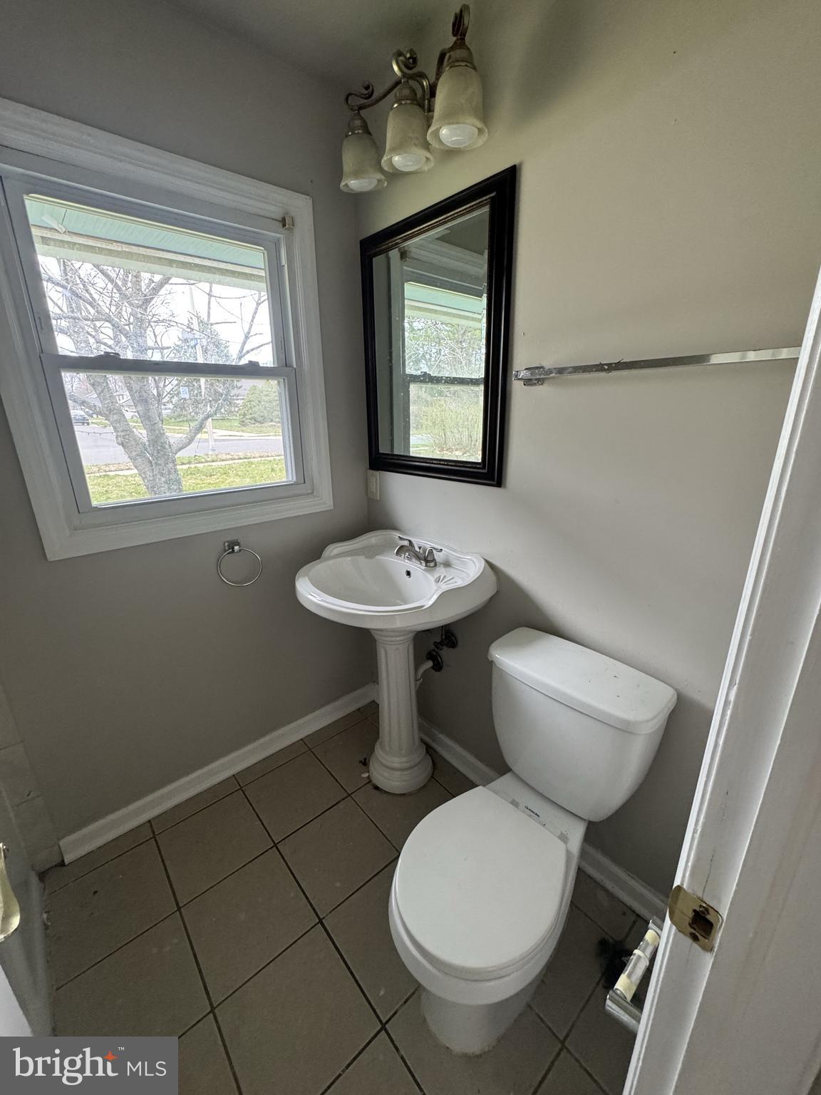 75 Mainbridge Lane Willingboro, NJ 08046 - Photo 8 of 8 a bathroom with a toilet a sink and a window