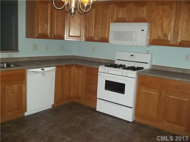 155 Kimball Road China Grove, NC 28023 - Photo 3 of 8 a kitchen with a stove and a microwave