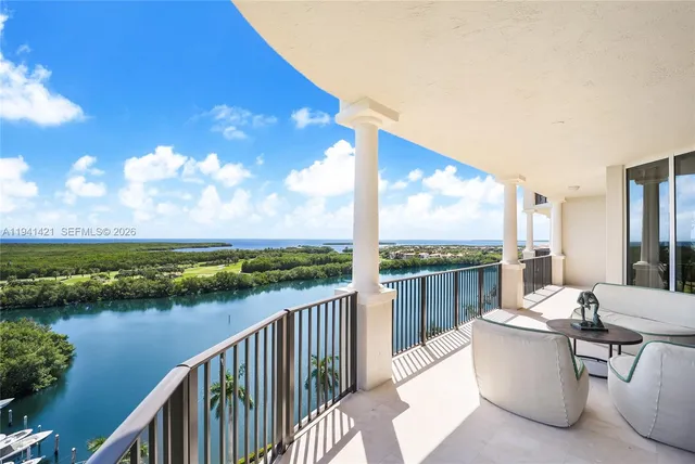 a view of a balcony with lake view and mountain view