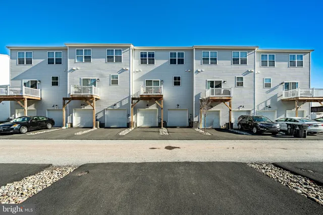 a front view of a building with street