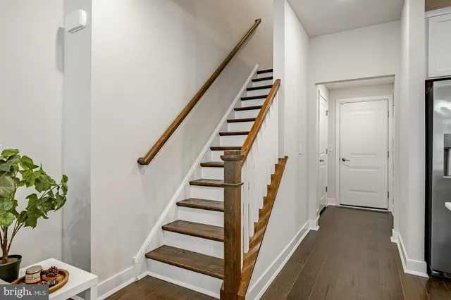 a view of entryway with wooden floor