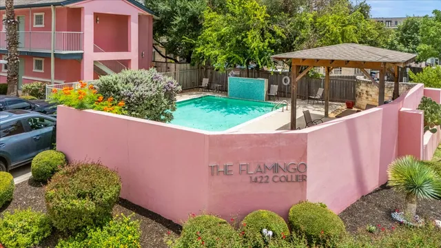 a view of a street with a sign board