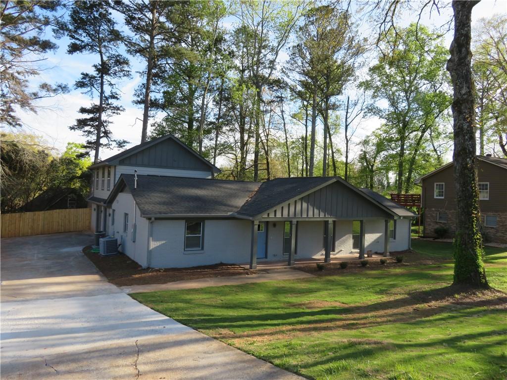 3775 Boring Road Decatur, GA 30034 - Photo 1 of 1 a front view of a house with a garden