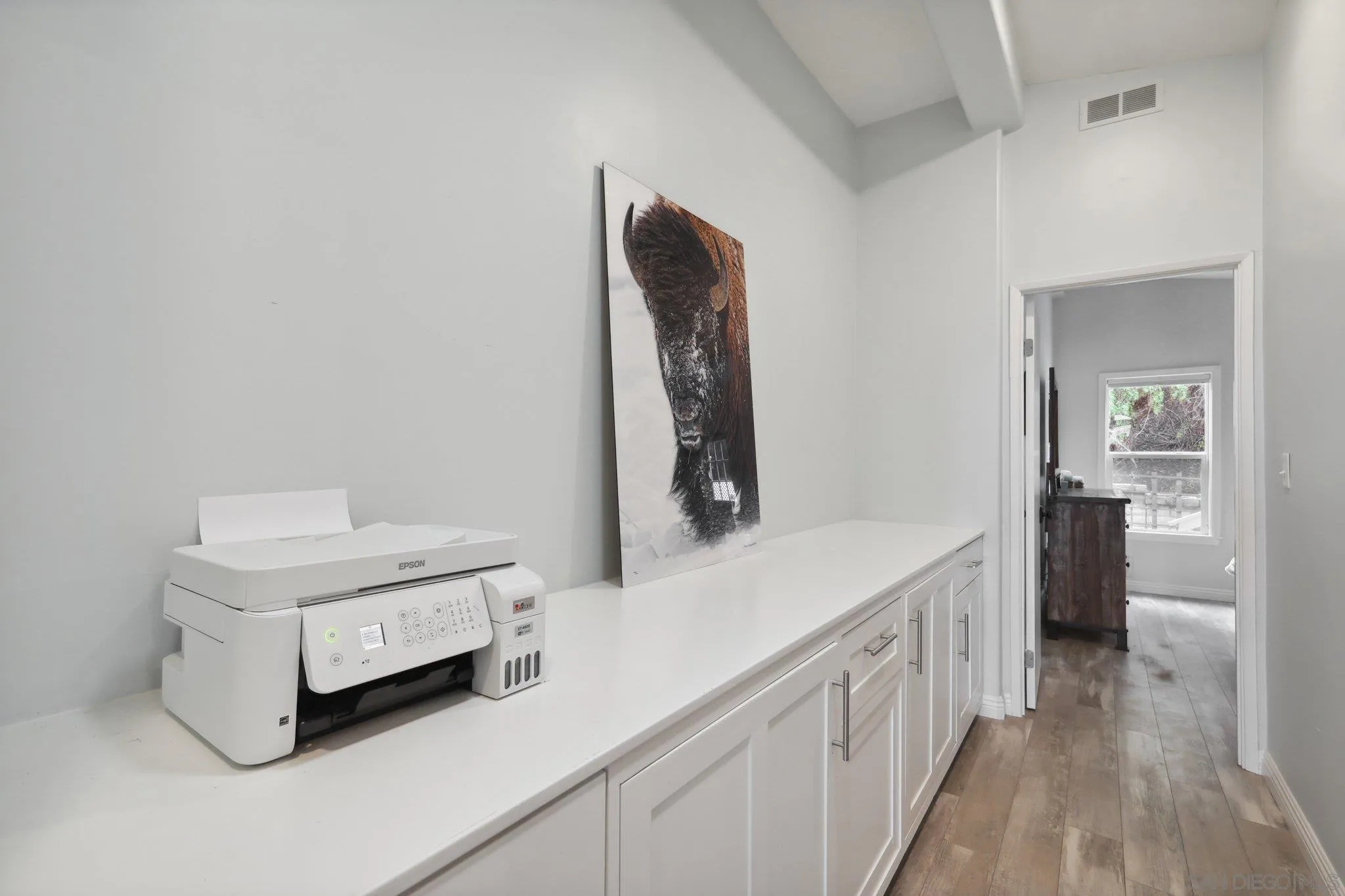 7002 San Bartolo Street, Unit 30 Carlsbad, CA 92011 - Photo 25 of 59 a bathroom with a sink a light fixture and a mirror