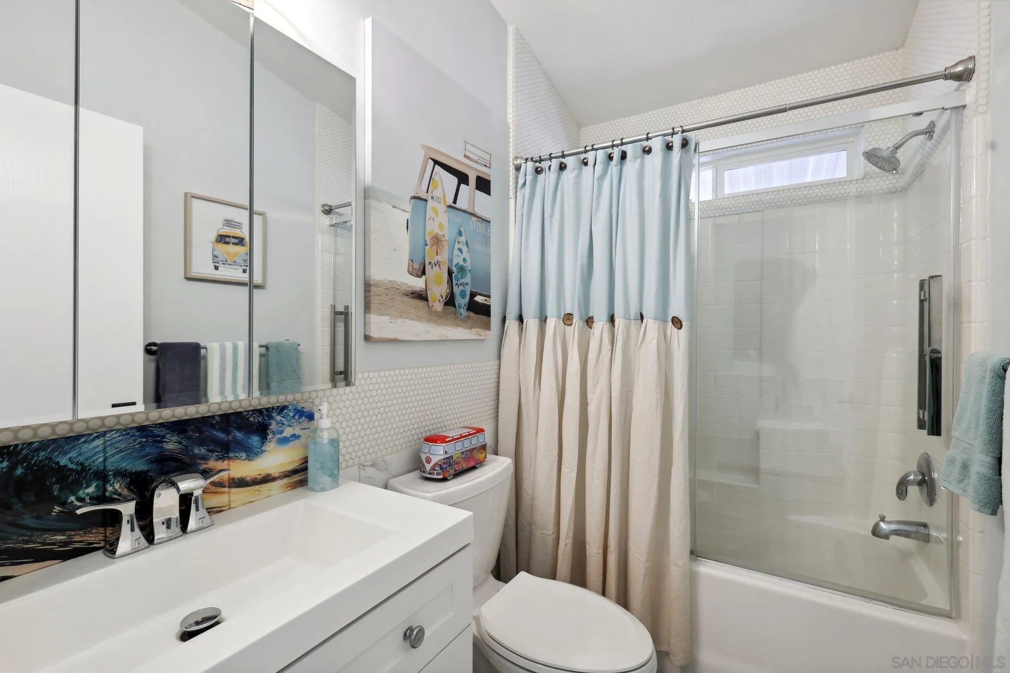 7002 San Bartolo Street, Unit 30 Carlsbad, CA 92011 - Photo 29 of 59 a bathroom with a sink toilet and shower