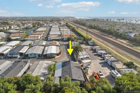 a view of a swimming pool with sitting area
