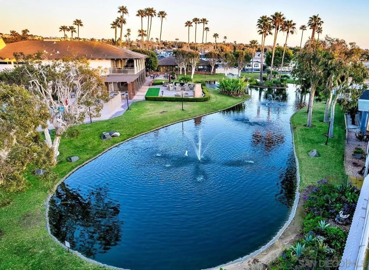 7002 San Bartolo Street, Unit 30 Carlsbad, CA 92011 - Photo 42 of 59 a view of a water fountain in front of the house